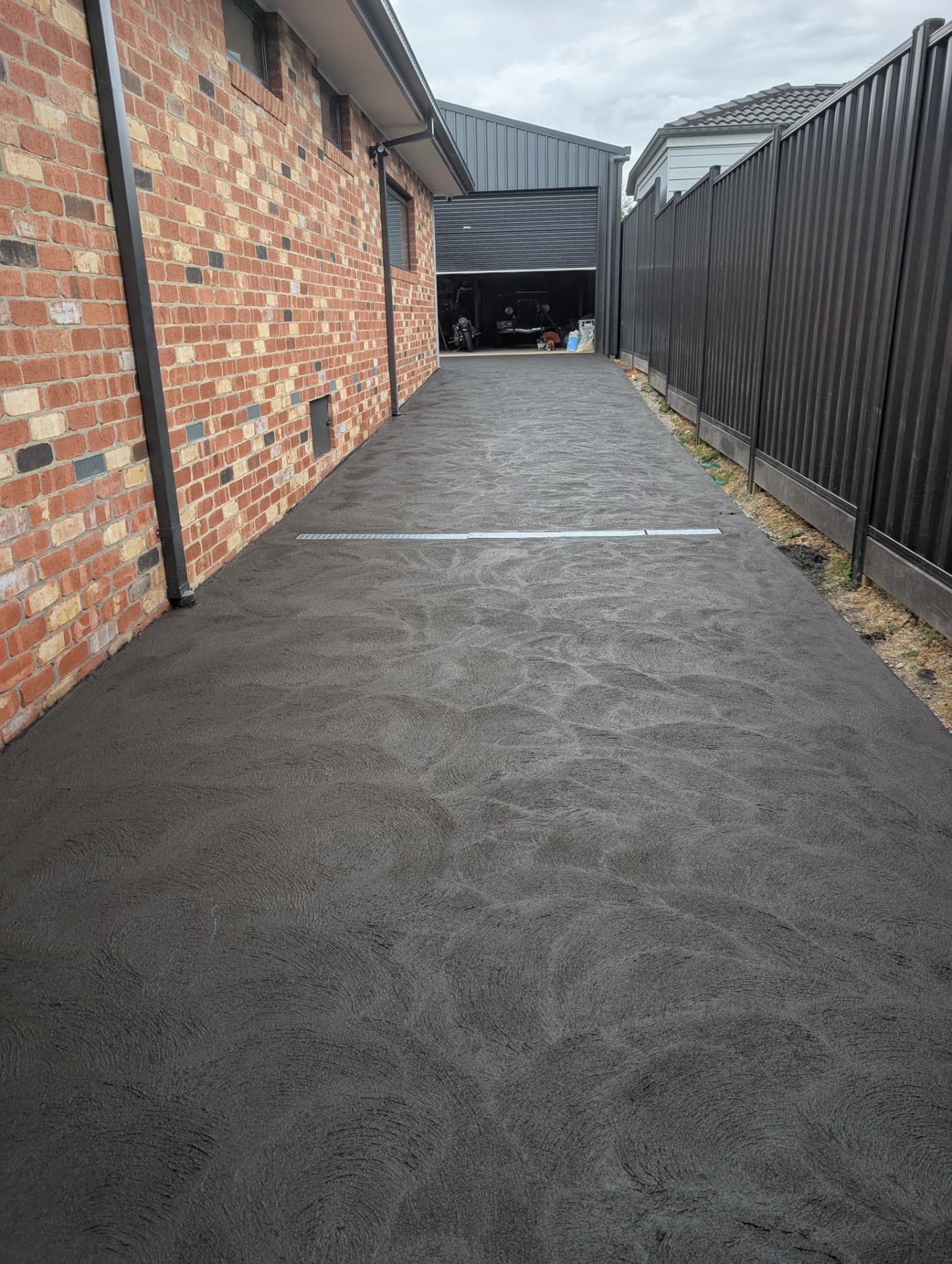 Charcoal side access driveway in Rowville