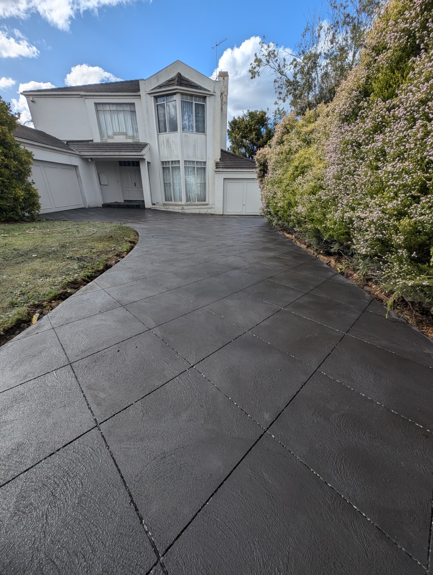 Slate-pattern stencil driveway in Knox