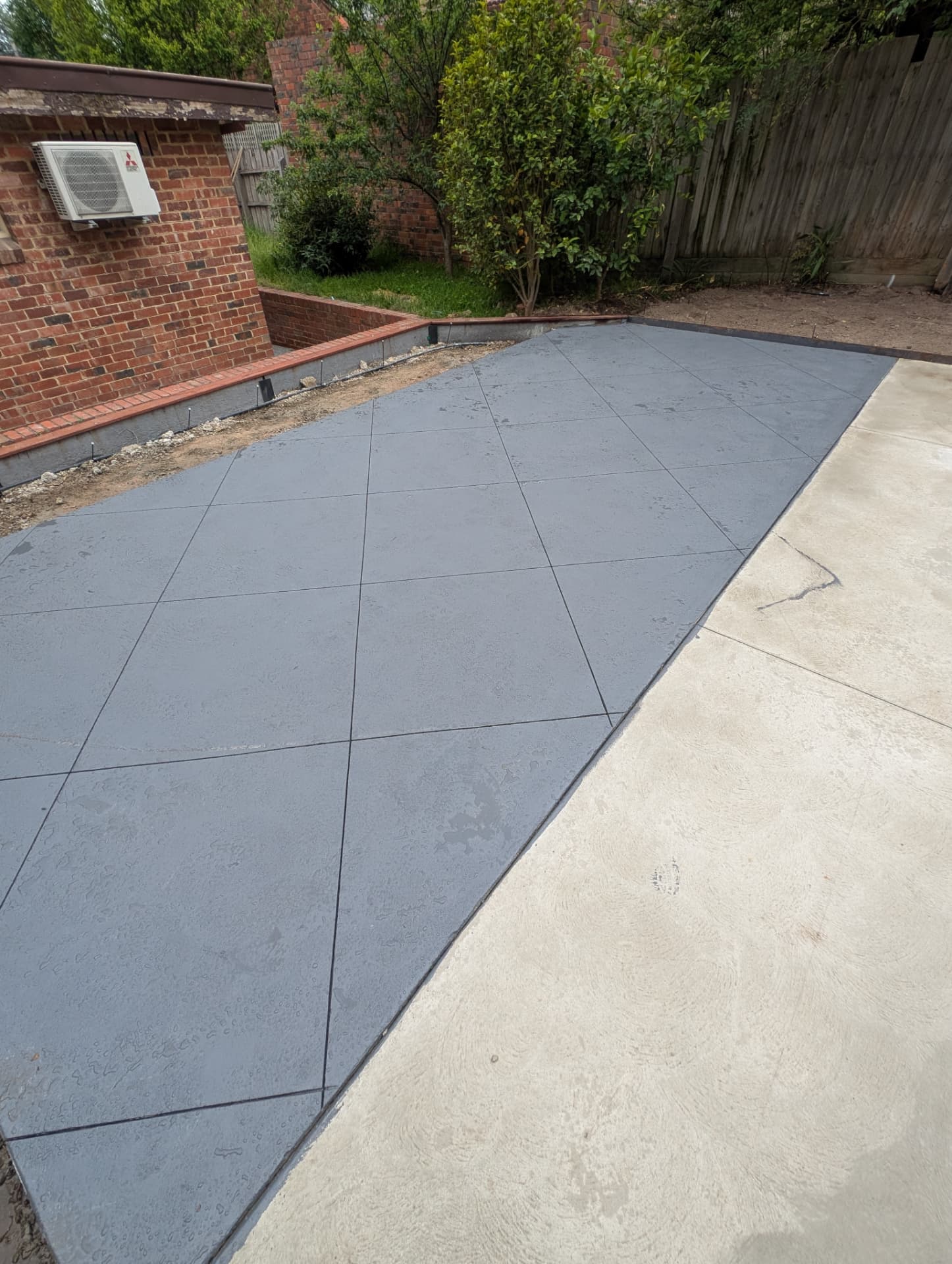 Coloured concrete patio slab in Boronia