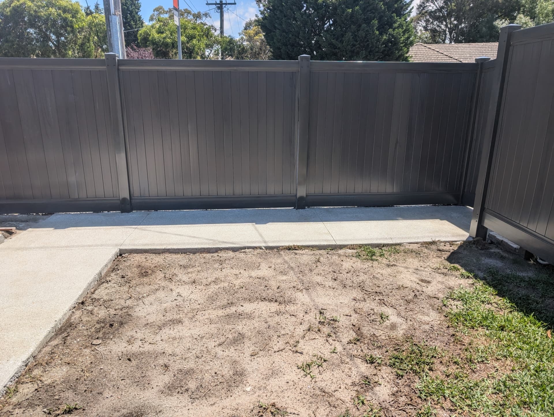 Composite privacy fence & concrete path in Melbourne east