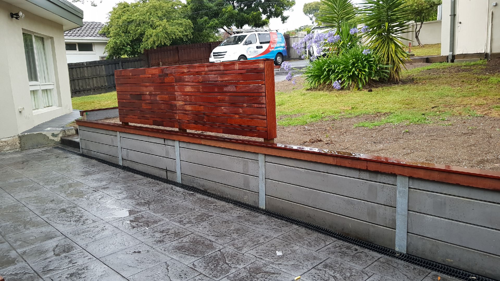 Concrete sleeper wall & merbau screen in Wantirna